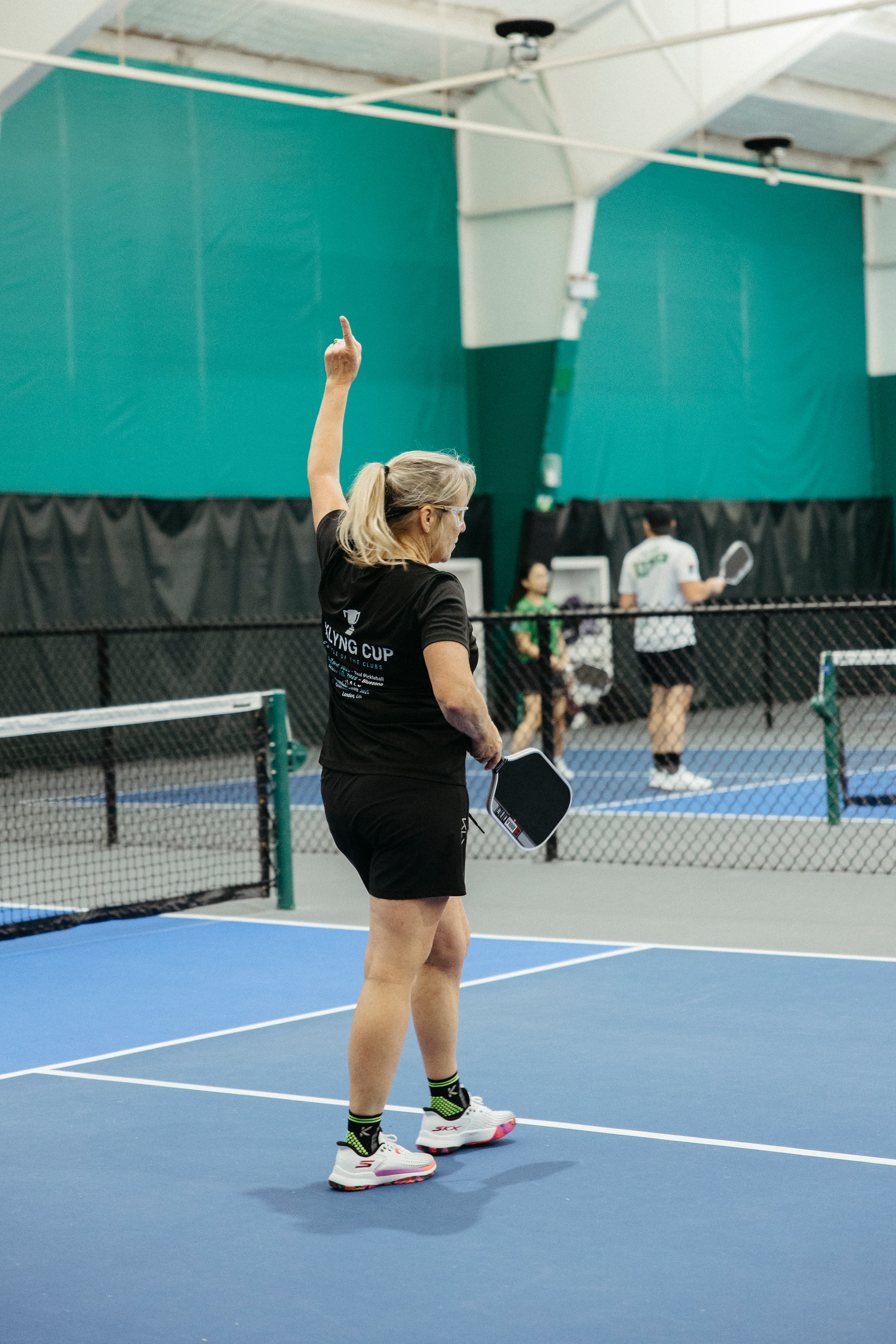 Player celebrating at a Klyng Cup event